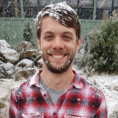 Portrait of Dr Mitchell Lyons